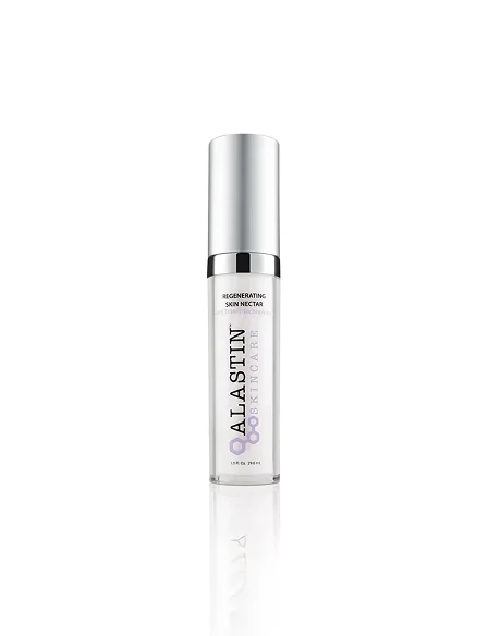 A tall, slender silver and clear bottle of ALASTIN Skincare Regenerating Skin Nectar standing upright on a reflective white surface. - Skincare in Los Angeles, CA